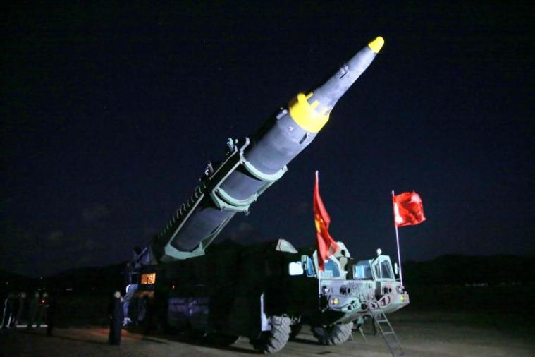 North Korean leader Kim Jong Un inspects the long-range strategic ballistic rocket Hwasong-12 (Mars-12)